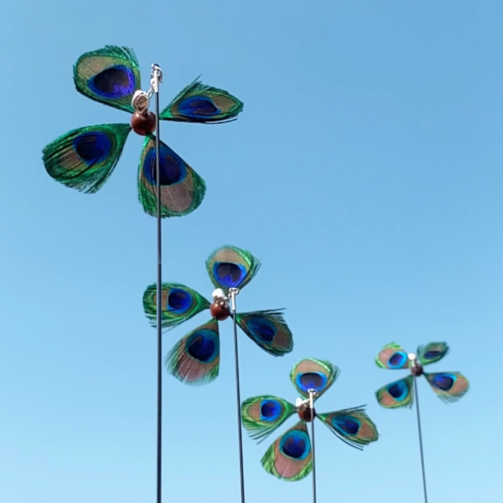 Peacock feather cat toy top