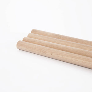Close-up of the wooden poles used in the Boho Chic Pet Tent, showcasing the high-quality, furniture-grade materials that ensure durability and style for modern homes.