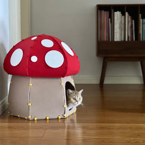 Cat peeking out of the Mushroom Felt Cat Cave indoors, blending with modern home decor.