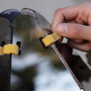 Close-up of the secure fasteners on the Rocket Cat Tower's panels.