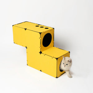 Yellow modular cat hideout block with circular entry hole, featuring a cozy and stylish space for cats to play and rest. Made with thick, durable felt material.