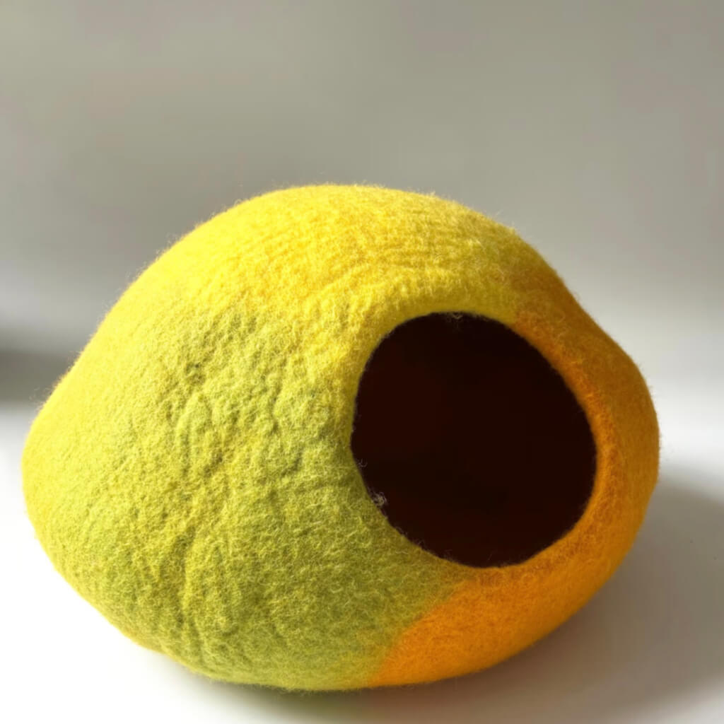 Product only: Amalfi Lemon wool felt cat cave — two-tone yellow/green modern enclosed cat house.