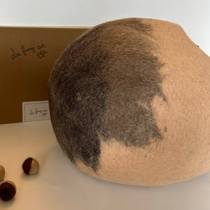 Back detail of Beige Mochi wool felt cat cave showing cocoa gradient texture — modern cat hideaway bed.