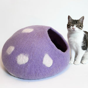 Cat sitting beside Taro Purple Modern Cat Cave with polka dots – 100% wool felt