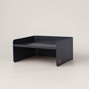 Black metal pet bowl stand with minimalist dual-height design – elevated feeding base for cats and small dogs.