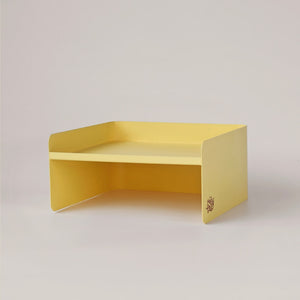 Yellow metal pet bowl stand with modern dual-height structure – stylish elevated feeder for small pets.
