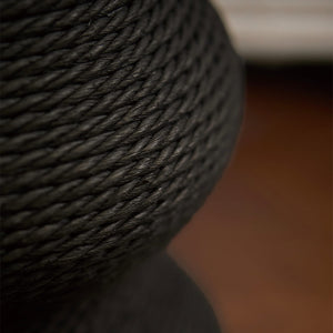 Close-up of black paper vine rope texture on the Minimalist Wavy Scratching Post replacement part. Durable and cat-friendly scratching material.