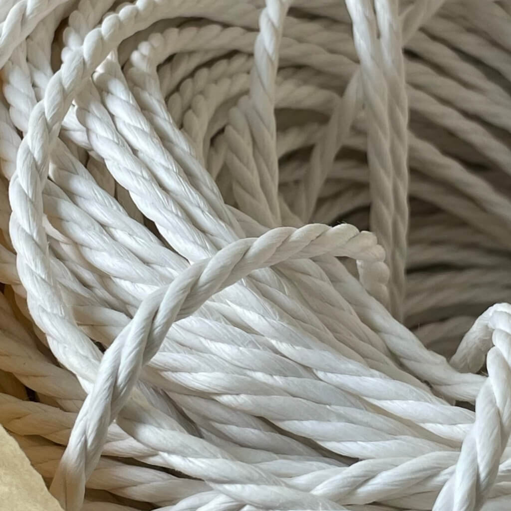 High-quality white paper vine rope used in the Minimalist Wavy Scratching Post replacement, ensuring a sturdy and satisfying scratching experience.