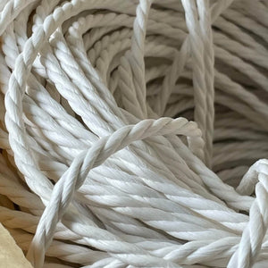 High-quality white paper vine rope used in the Minimalist Wavy Scratching Post replacement, ensuring a sturdy and satisfying scratching experience.