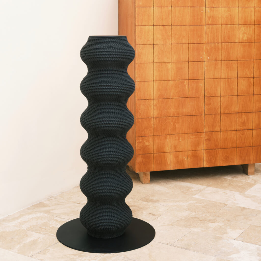 Modern Wavy Scratching Post in a minimalist home setting with neutral tones.