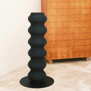 Modern Wavy Scratching Post in a minimalist home setting with neutral tones.