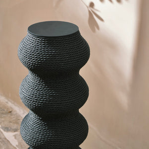 Close-up of the Wavy Scratching Post’s durable paper vine texture, with natural light enhancing the details.