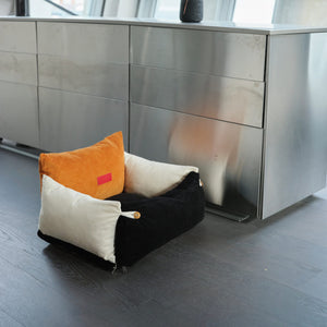 Comfortable and trendy Pure Cotton Corduroy Pet Couch with a sleek black and orange design.