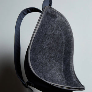 Extra-light Cat Travel Backpack - minimalist, stylish design against a blue sky background.