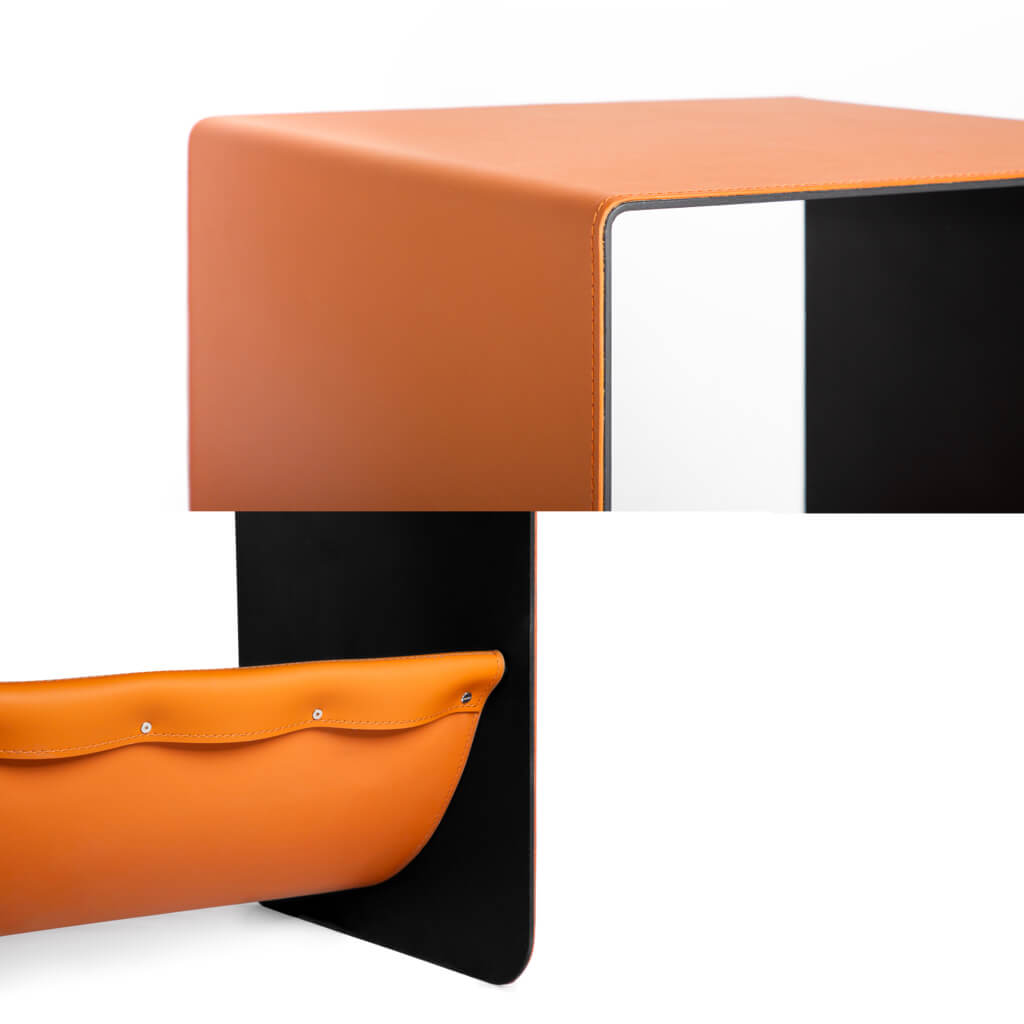 Close-up of saddle leather stitching and fine craftsmanship, highlighting the durability and premium quality of the cat cave side table.