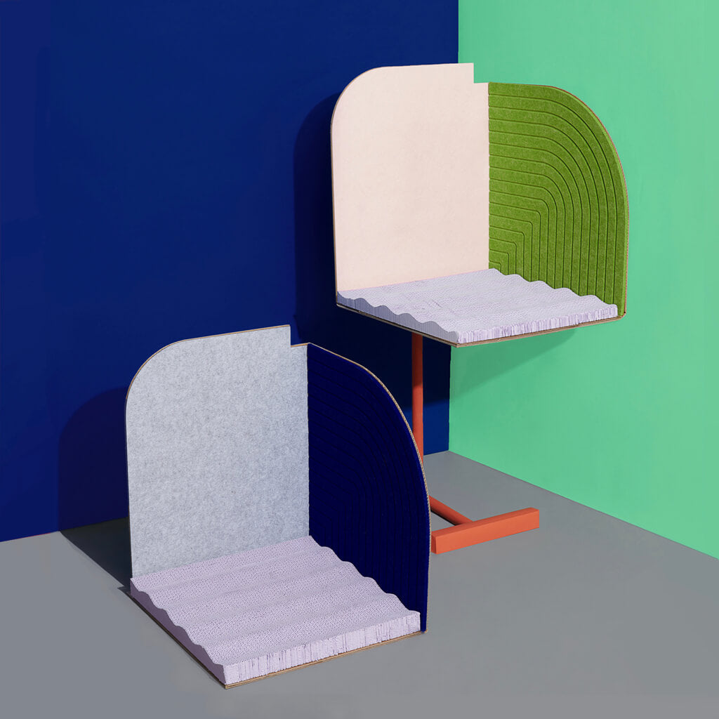 Two variations of the Purrre 3-Dimensional Design Cat Scratcher in Velvet Blue and Lawn Green setups, perfect for corner spaces.