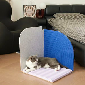 Cat Relaxing on Scratcher: Gray and white cat lounging comfortably on the Purrre 3-Dimensional Design Cat Scratcher, blending comfort with modern style.