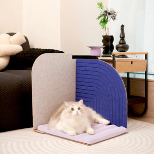Cat Lounging on Velvet Blue Scratcher: Fluffy white cat lounging on the Purrre 3-Dimensional Design Cat Scratcher in Velvet Blue, adding a cozy vibe to your living space.