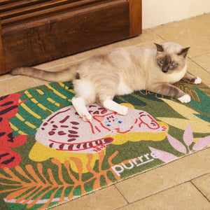 Cat lounging comfortably on large Tropical Jungle Cat Mat by Purrre – stylish and pet-friendly.