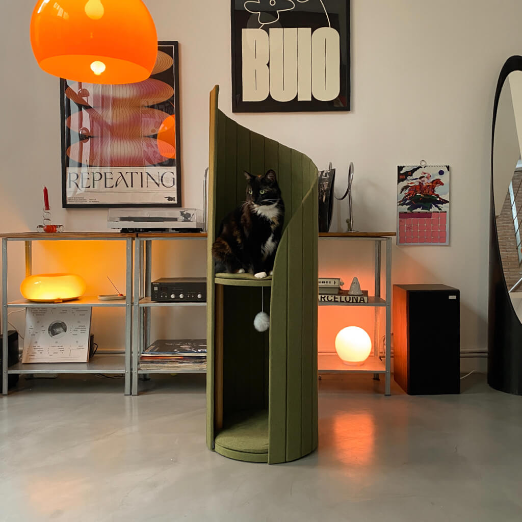 Time Travel Tower Cat Tree in Pine Green, featuring a modern spiral design and a cozy perch for cats, blending seamlessly into stylish home decor.