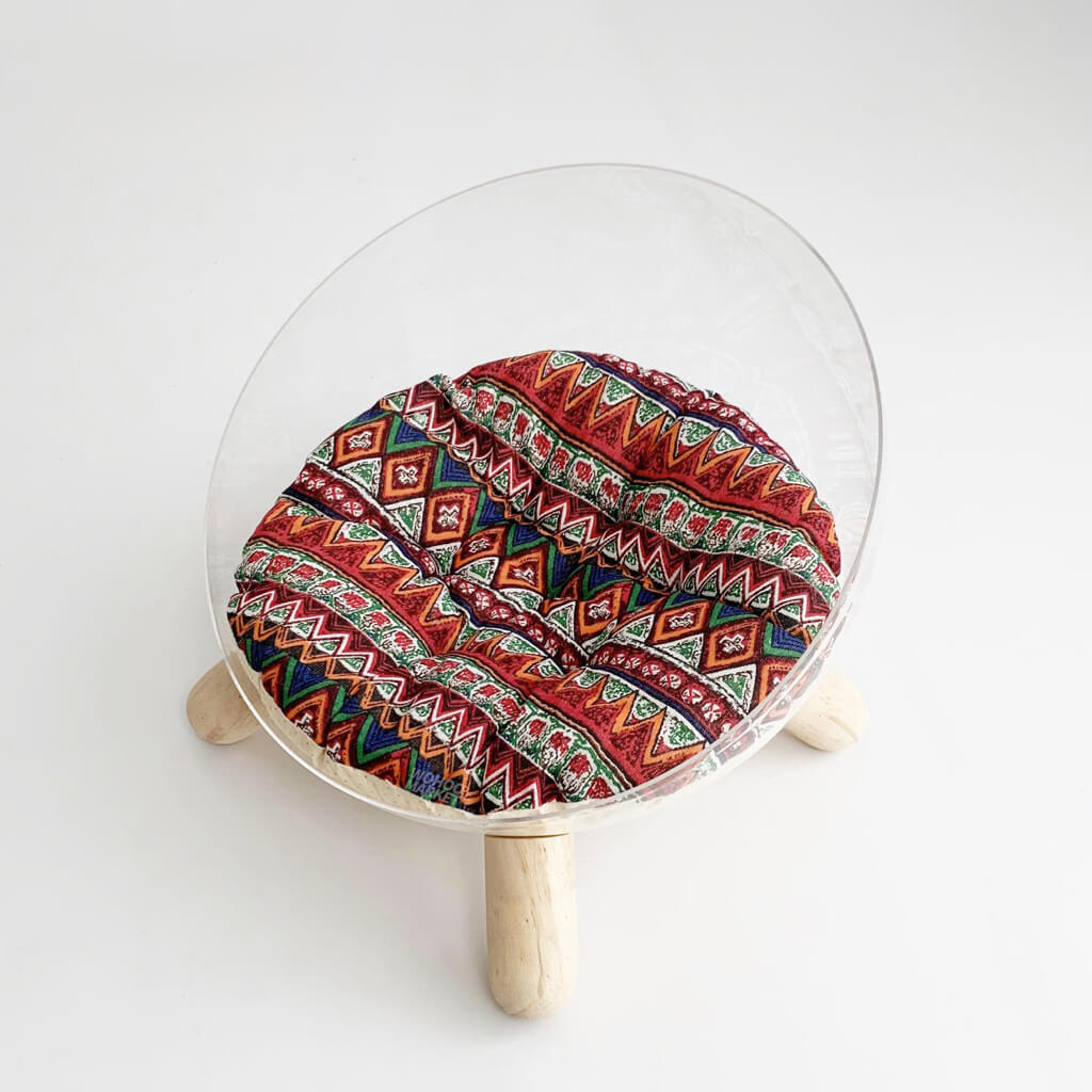 Clear bowl-shaped cat bed with bold red geometric cotton-linen cushion – Bohemian style