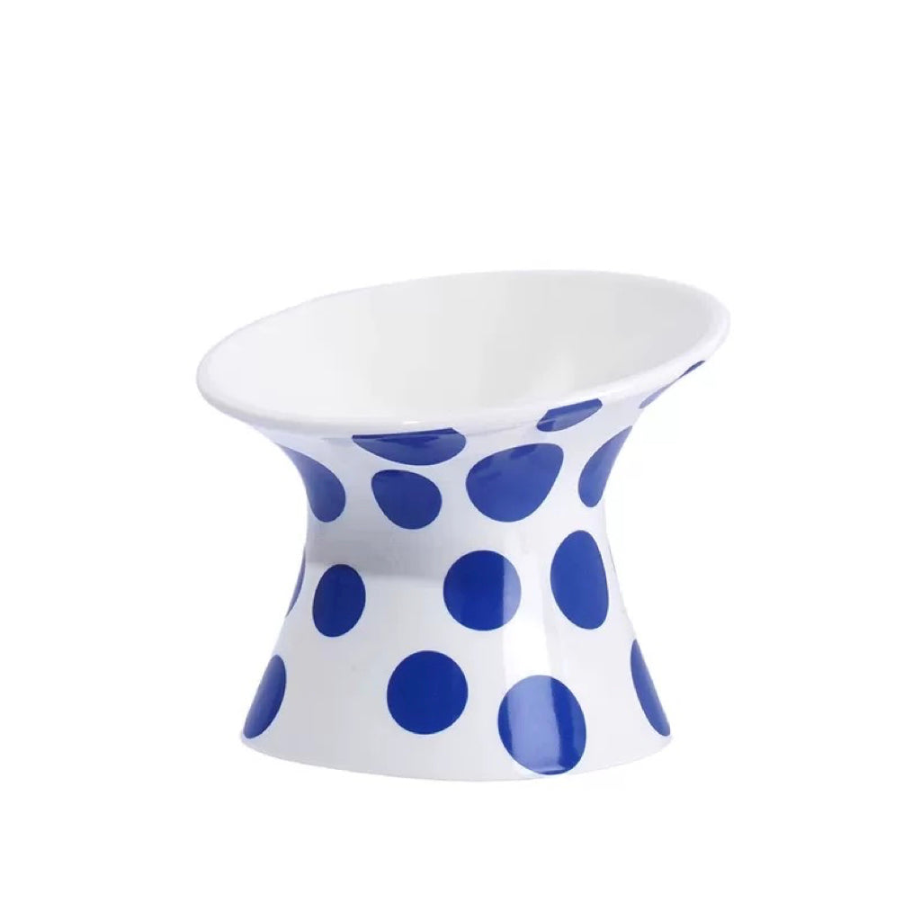 Side view of the ZEZE Elevated Ceramic Bowl in Blue Polka Dots.