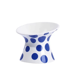 Side view of the ZEZE Elevated Ceramic Bowl in Blue Polka Dots.