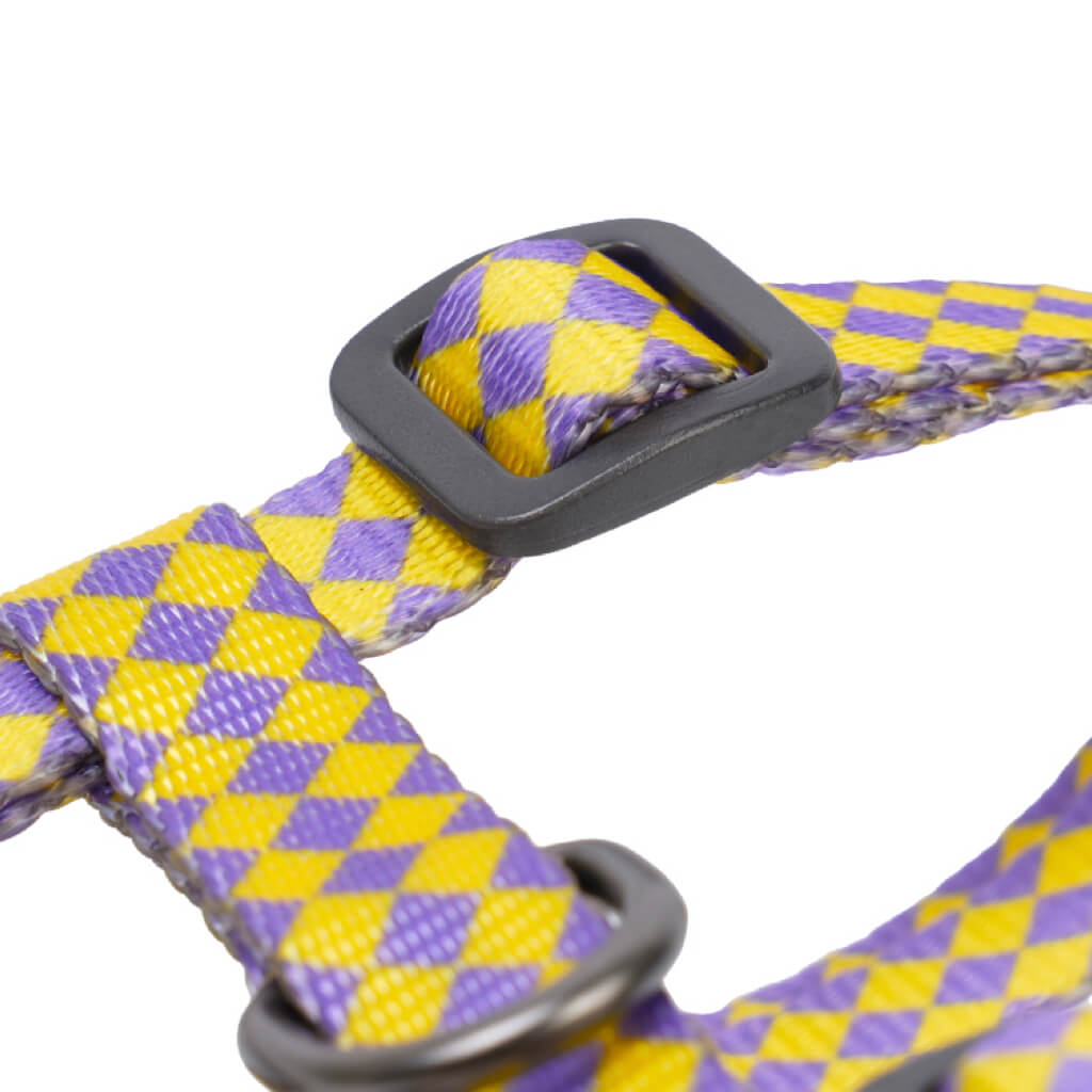 Macro view of high-density checkered strap and buckle from ZEZE cat harness.