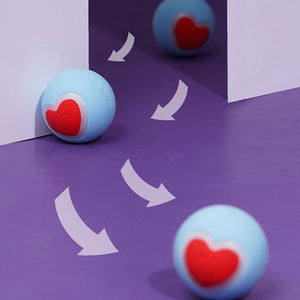 Interactive smart cat toy ball bouncing between walls with motion-activated arrows.