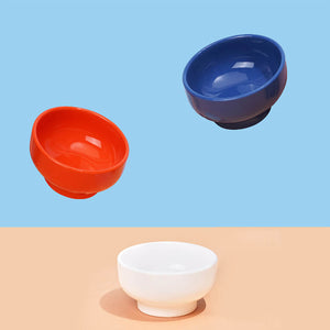 Bright and fun orange, blue and white ceramic pet bowls for small dogs and cats.