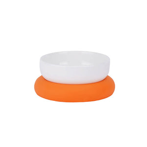 White and orange single ceramic pet bowl with food-grade silicone base for stability.