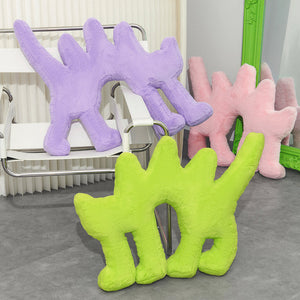 Fluo Green Boom Boom Cat Cushion next to purple and pink cushions in a modern setting.