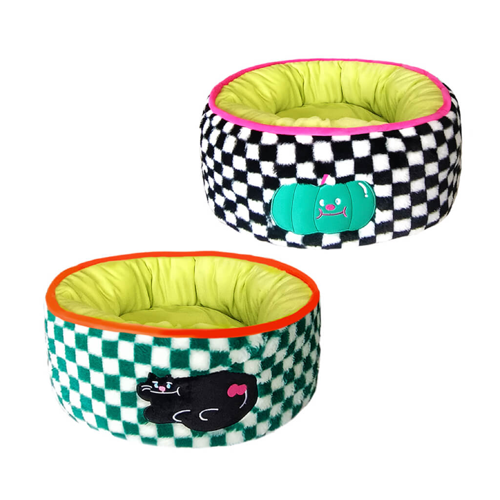 Checker pattern pet bed in black and white with lime green interior, offering a cozy resting space.