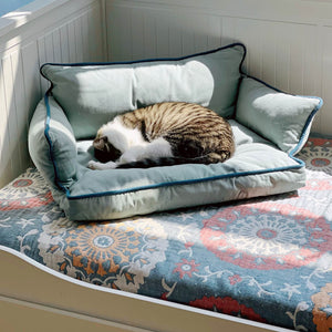 Cozy Pet Sofa Bed - Piped #23 Zweig with light blue fabric and contrasting deep blue piping for a modern look.