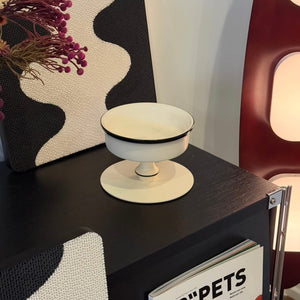Bamboo Island elevated ceramic pet bowl on cabinet—minimalist black/white design feeder that complements modern décor.