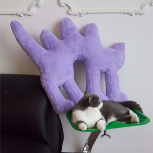 Gelato Purple Cat Cushion with a lounging gray cat beside it.
