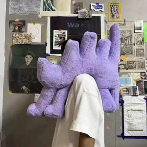 Gelato Purple Boom Boom Cat Cushion on the head of a person in a quirky home setting.