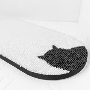 White version of the Cat Yin Yang Scratch Pad, offering a minimalist design with a black cat silhouette on a corrugated cardboard surface.