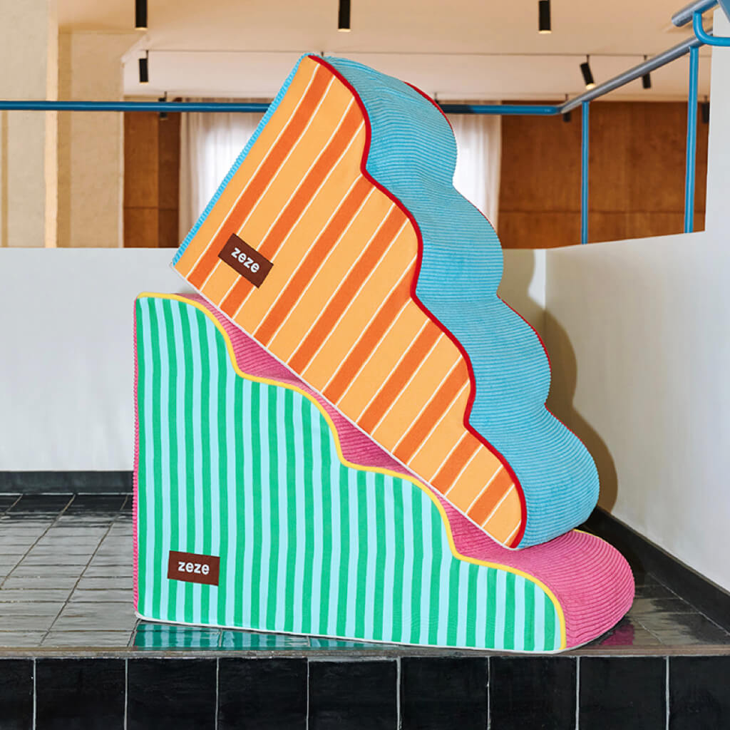 ZEZE foam pet stairs in two colorful designs stacked together; lightweight wavy pet steps for dogs & cats, safe bed/couch access.