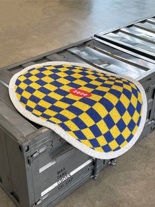 Plaid Design Litter Mat Laid Flat on Industrial Surface.