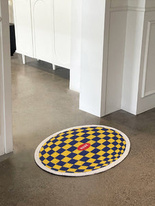 Plaid Litter Mat Styled as Home Decor in a Modern Living Room.