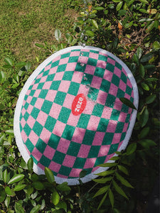 Design Plaid Litter Mat Laid Outdoors for Water Resistance Demonstration.