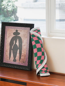 Design Plaid Litter Mat Rolled Up and Styled with Home Decor.
